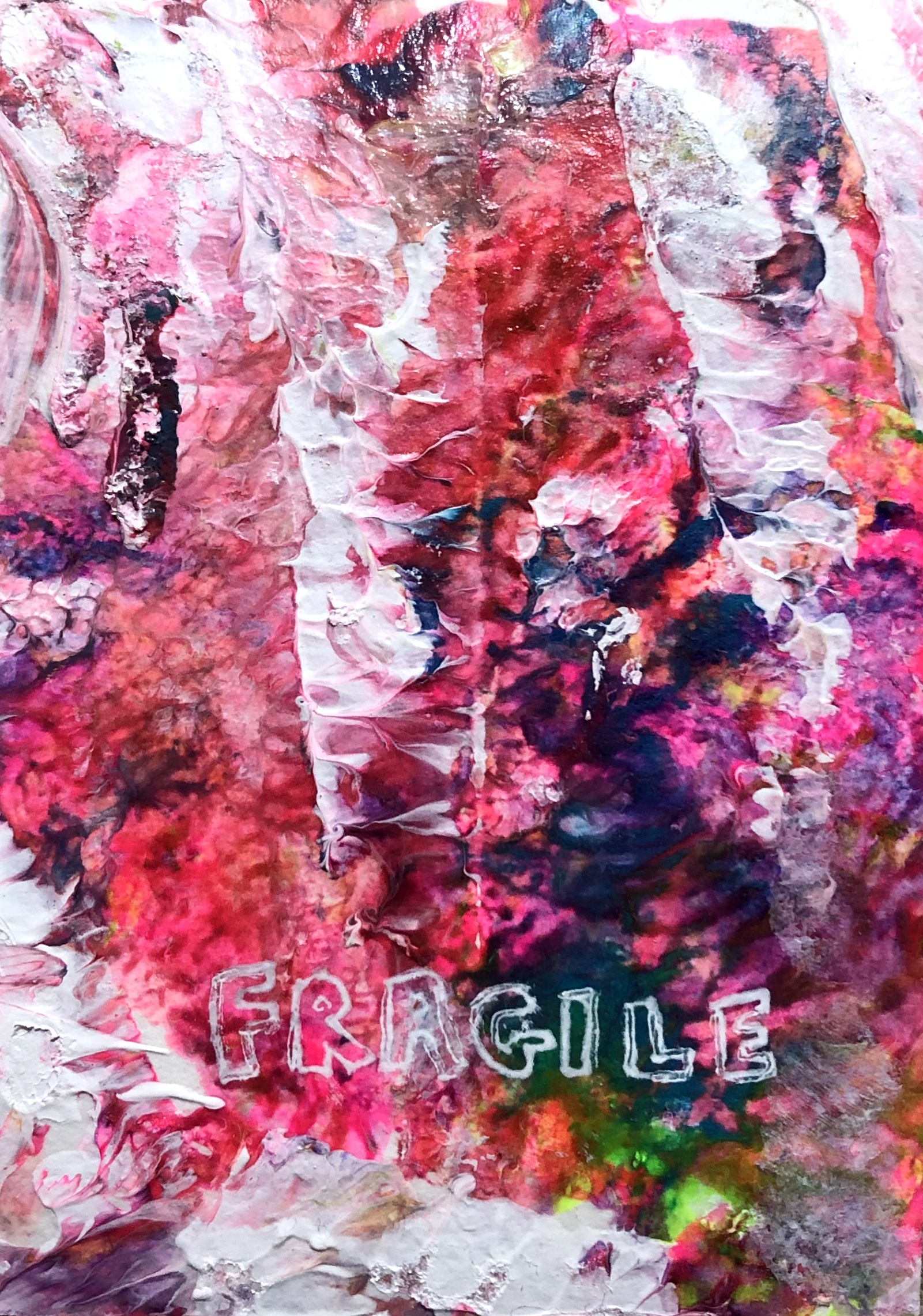 An art journal page with an abstract acrylic paint pour with the word fragile written over it.
