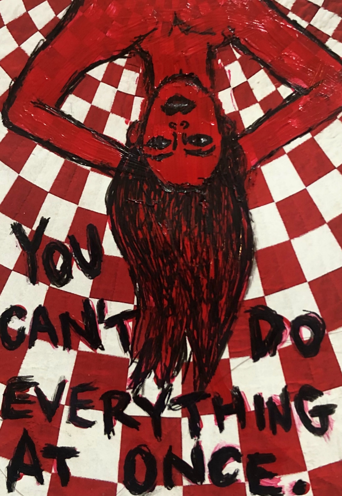 An illustration of a red woman upside down against a red and white checkered background with the words, “you can't do everything at once,” underneath her.