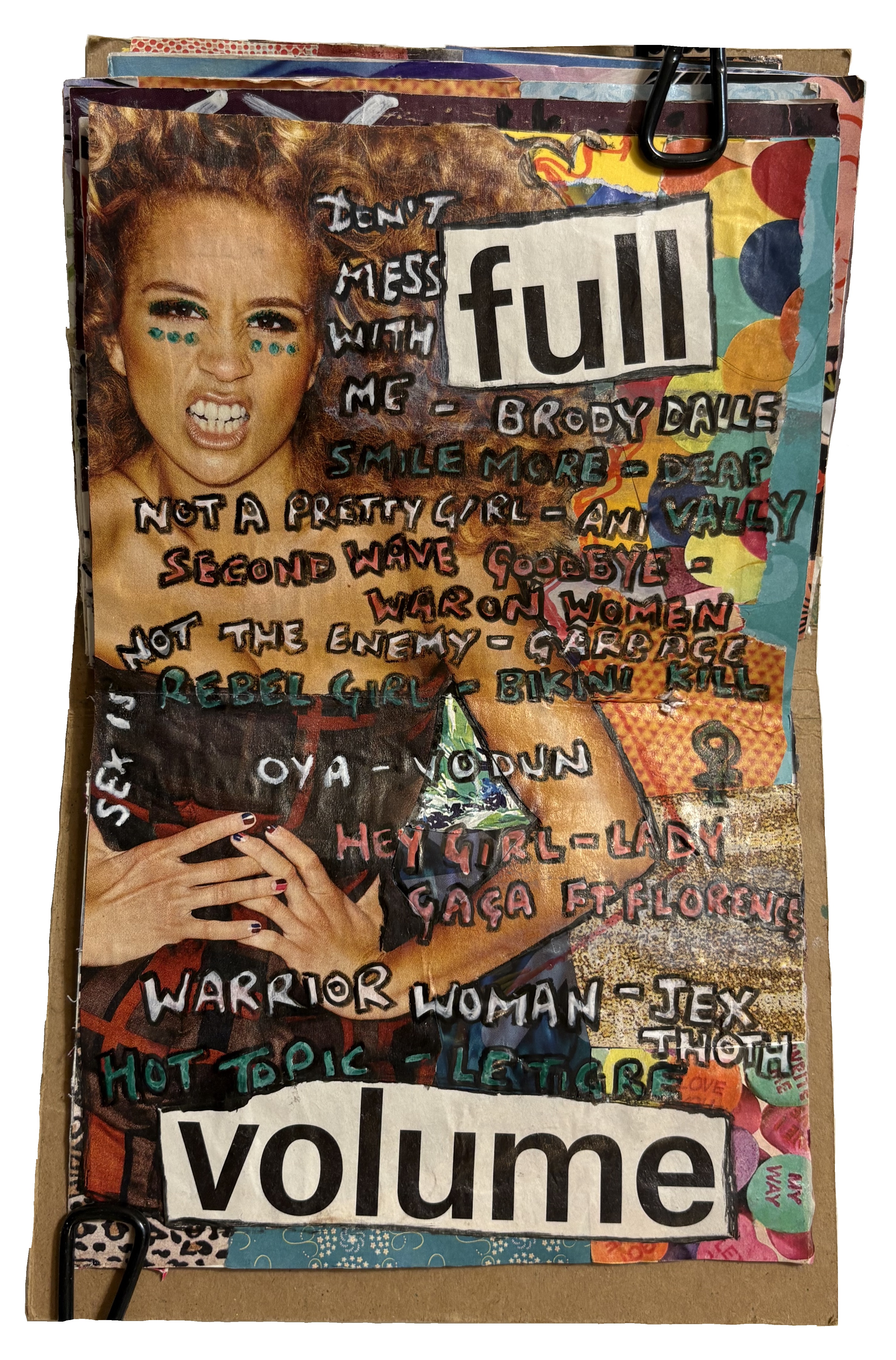 Art Every Day Month Day 22. A mixed media art journal collage of a woman looking fierce with the words full volume next to her and a playlist of songs.